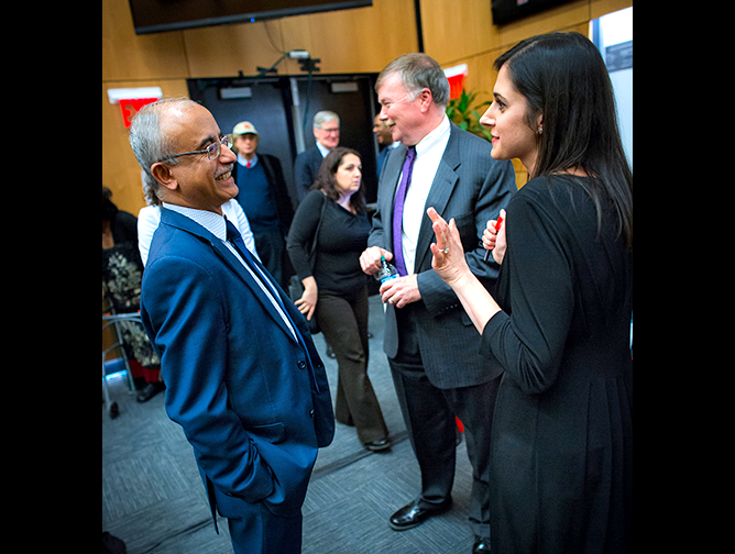 Chancellor Deba Dutta talking with Ava Majlesi